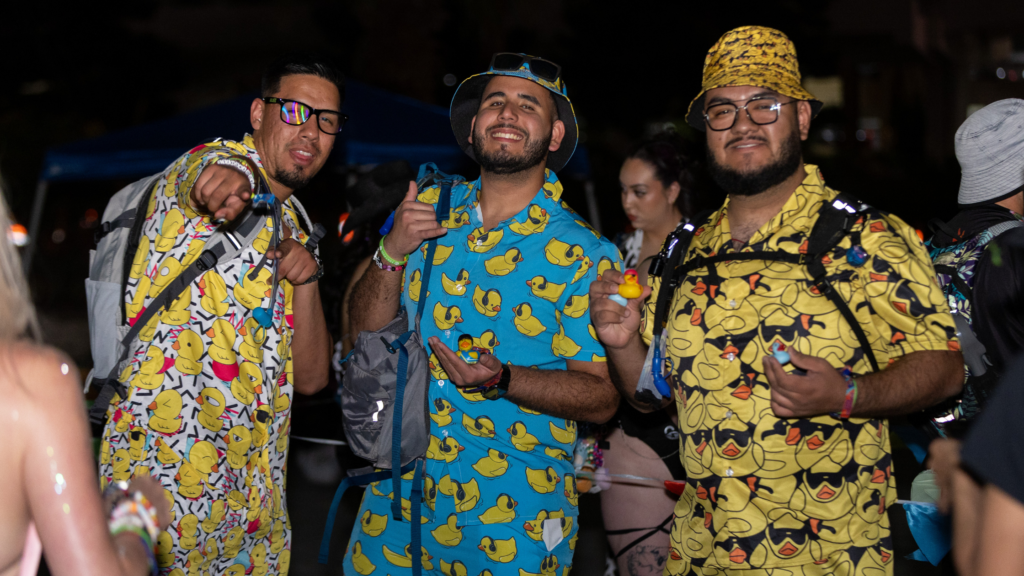 Different groups of people at EDC Vegas showing off their unique festival styles.